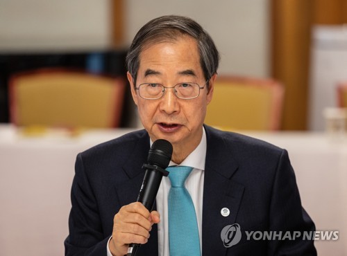  PM asks Yoon to veto grain bill