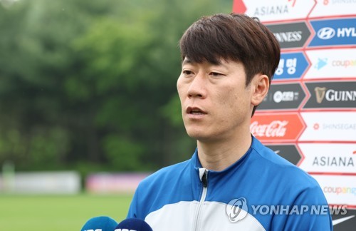 In this file photo from May 7, 2023, Kim Eun-jung, head coach of the South Korean men's under-20 national football team, speaks to reporters at the National Football Center in Paju, some 40 kilometers northwest of Seoul. (Yonhap)
