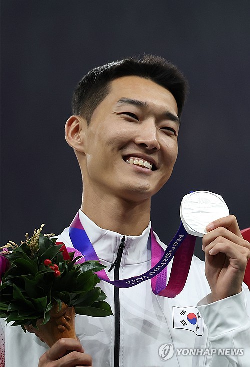 High jumper Woo wins silver in Asiad