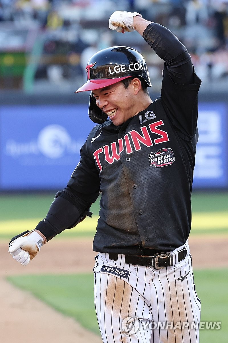 Moon Sung-ju of the LG Twins celebrates after hitting a triple against the KT Wiz during the top of the seventh inning in Game 4 of the Korean Series at KT Wiz Park in Suwon, Gyeonggi Province, on Nov. 11, 2023. (Yonhap)