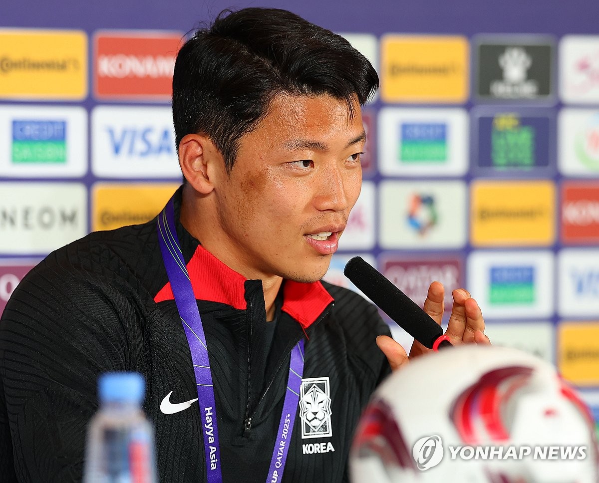 South Korean midfielder Hwang Hee-chan speaks at a press conference ahead of the Asian Football Confederation Asian Cup Group E match against Bahrain at the Main Media Center in Doha on January 14, 2024 (Yonhap News)