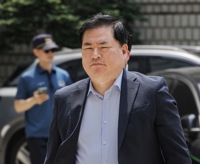 '유동규 휴대전화' 폐기한 사실혼 배우자 2심도 집유