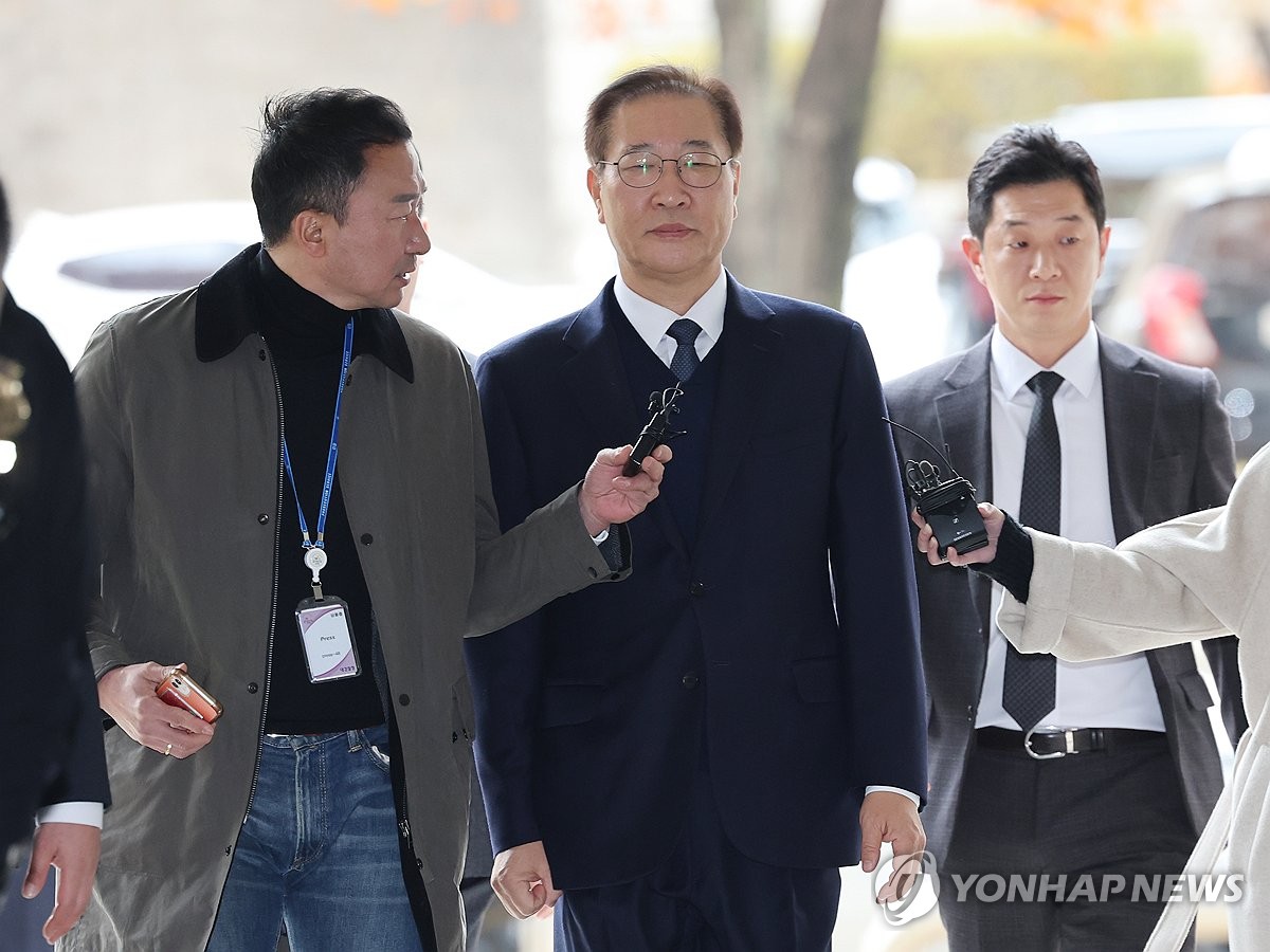 연합뉴스 사진: 법원 출석 장면